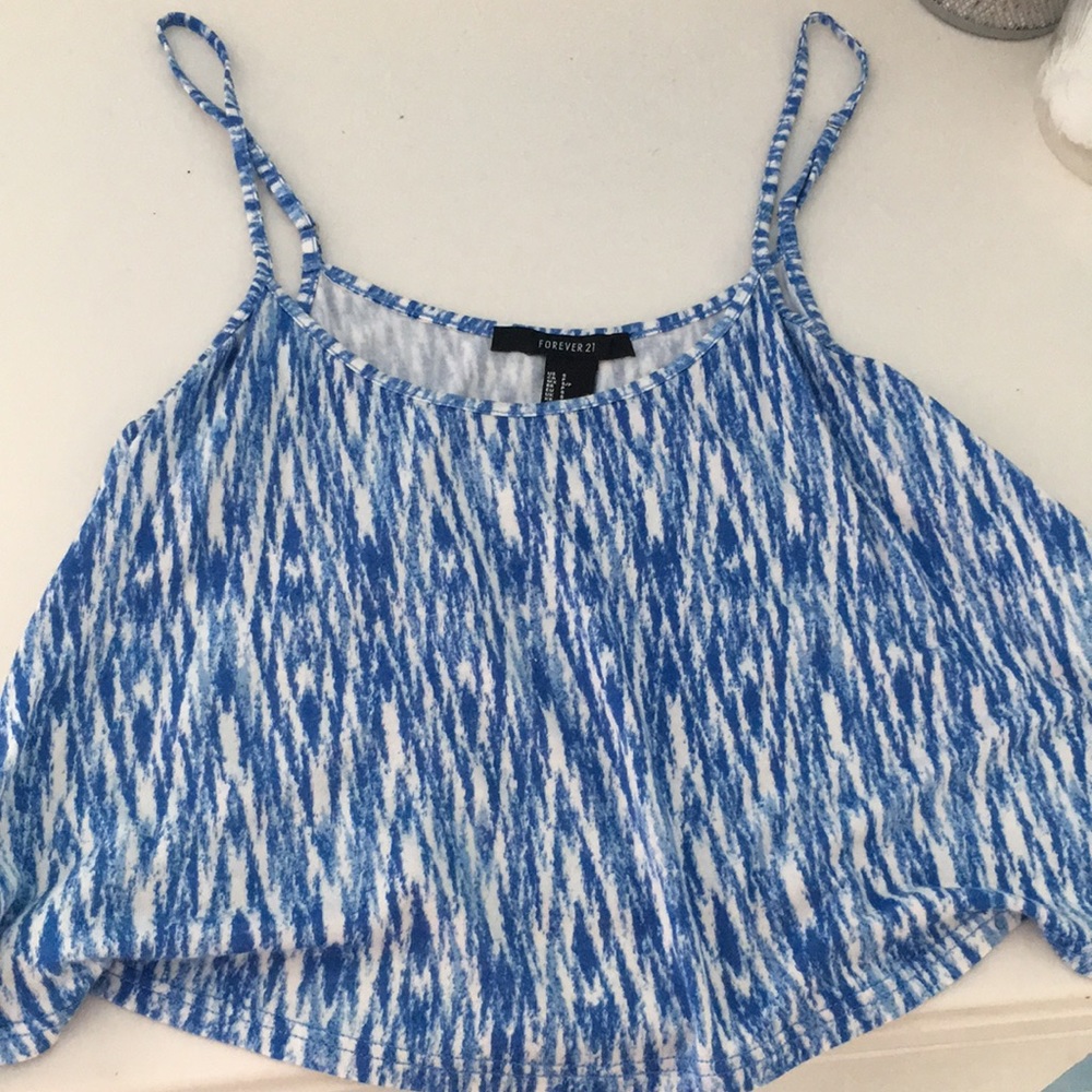 a blue and white cropped tank top